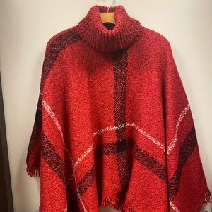 Turtleneck fringe cape